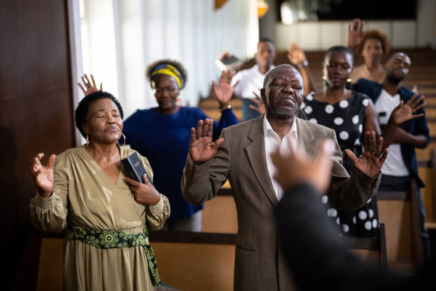 Multi-generation family and congregation enjoying church service